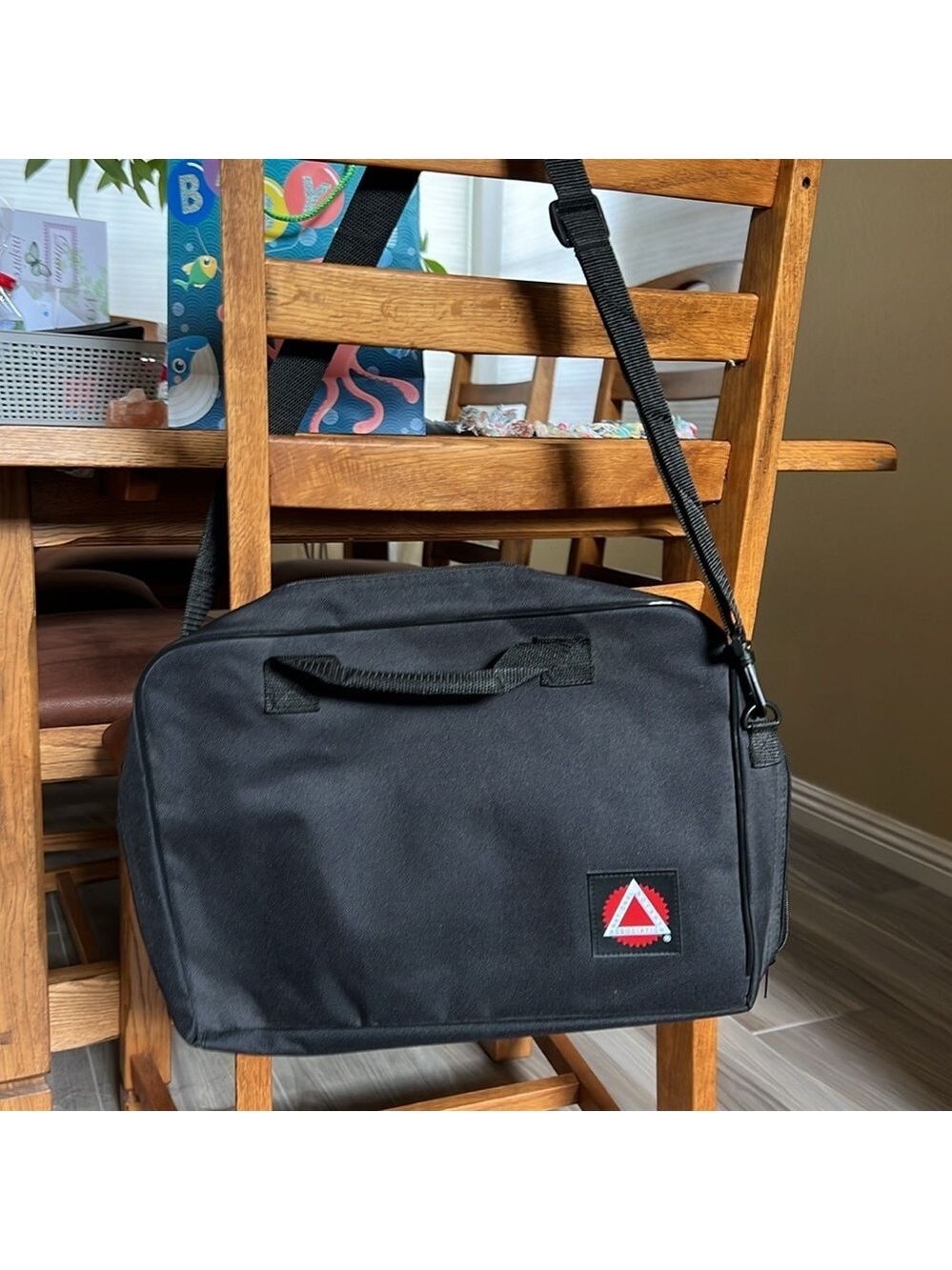 Black Crossbody Travel Bag with Red Accent Patch